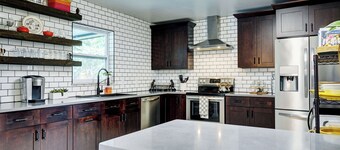 Dog-Friendly home with quick access to the beach and downtown with heated pool.
