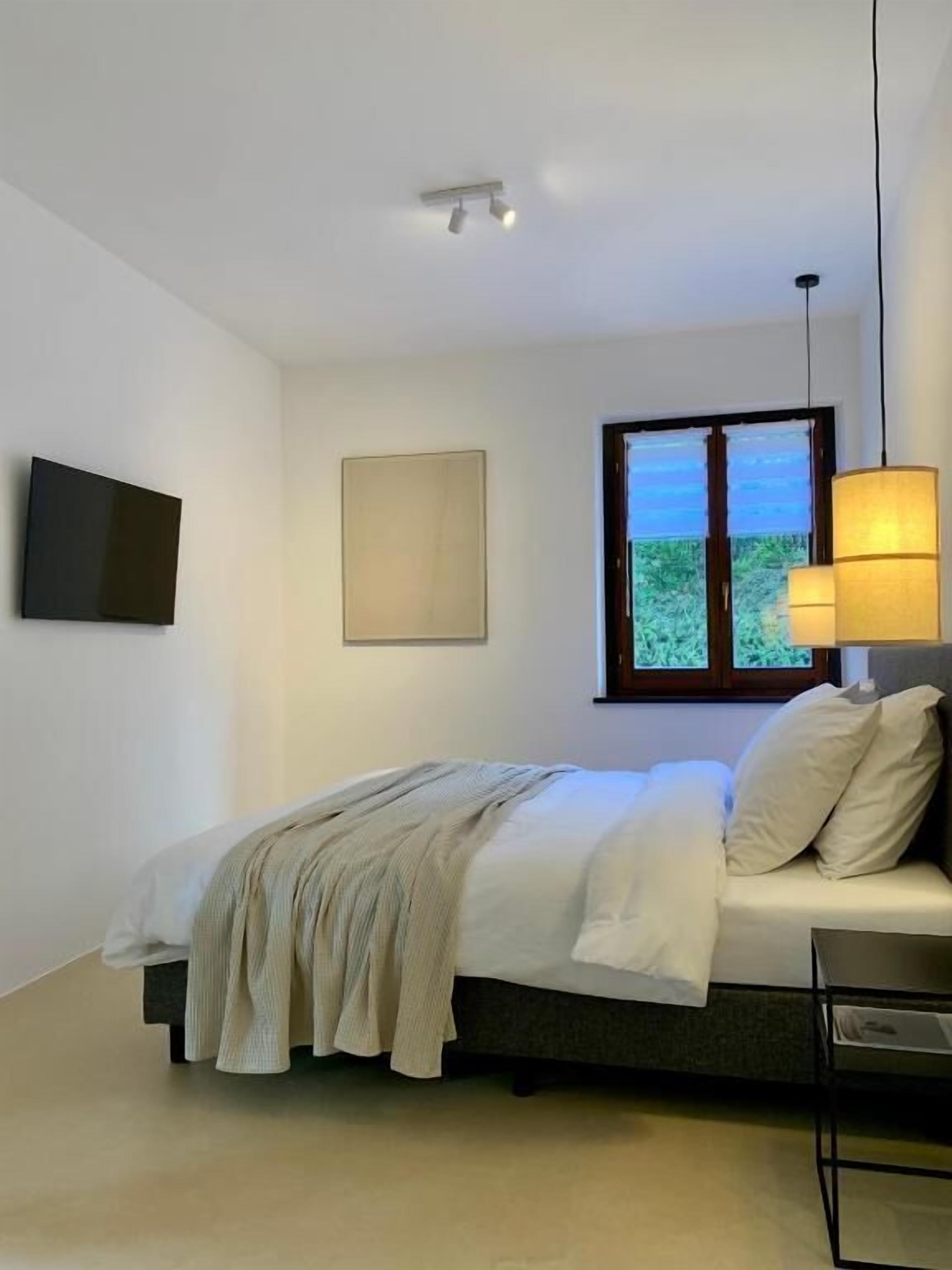 Deluxe Double Room, 1 King Bed, Garden View | Blackout curtains, free WiFi
