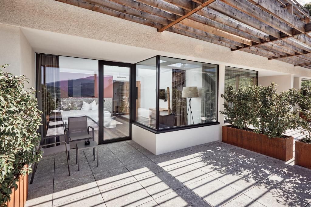 Suite, balcón, vista a la ciudad | Terraza o patio