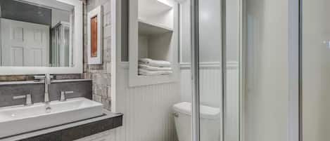 Shower, hair dryer, towels, soap
