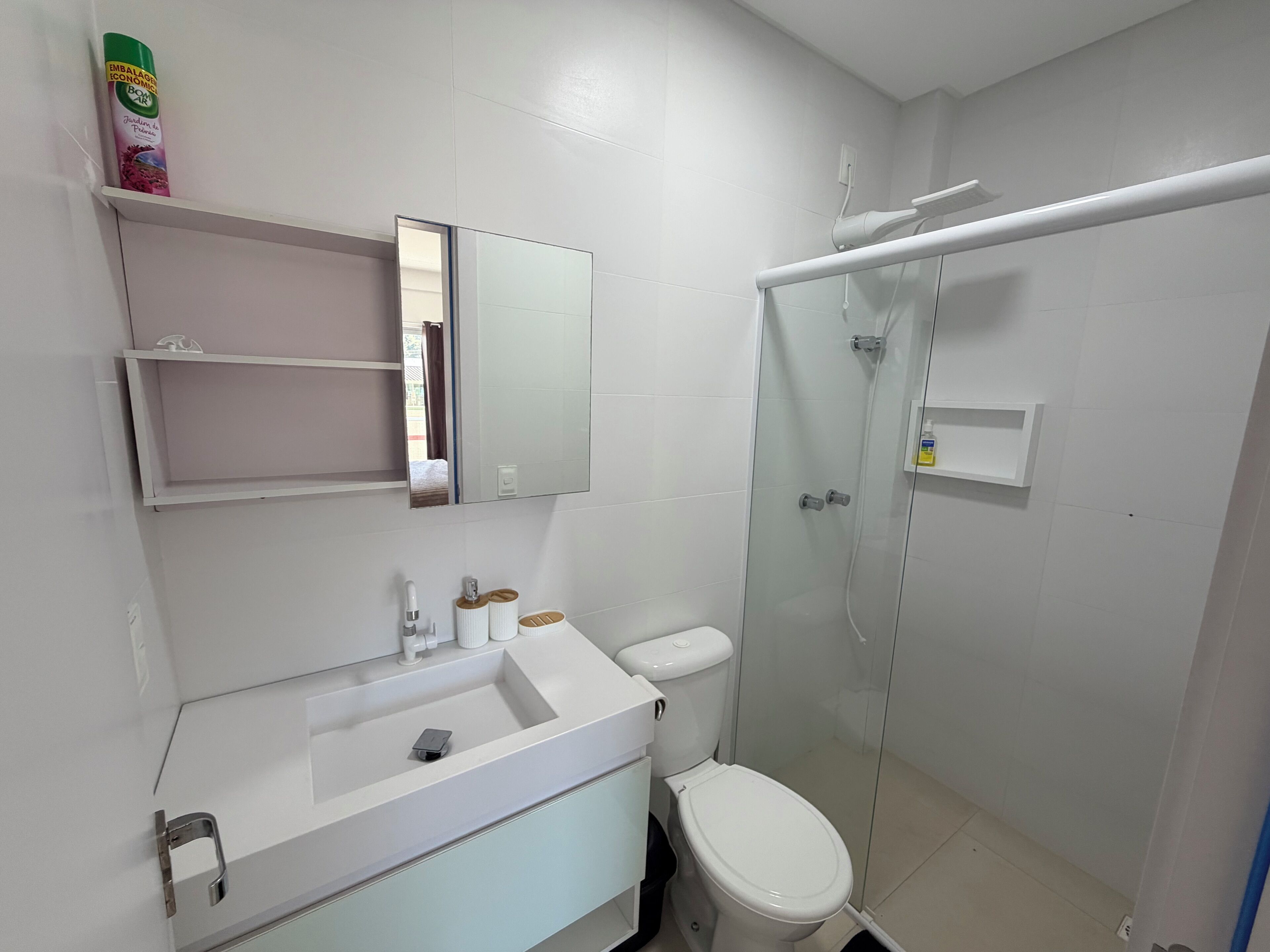 Shower, hair dryer, towels, toilet paper