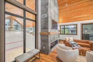 Floor-to-ceiling windows bring the outdoors right inside.