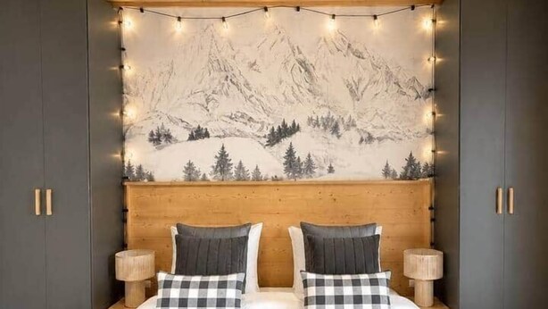 A bedroom with a bed, two bedside tables, a headboard with a mountain mural, and two wardrobes. - The Marmots' Nest • Mountain View • 6 people (Orcières)