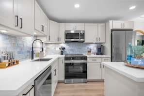 Condo de lujo, vista al jardín, junto a la playa | Cocina privada