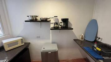 Departamento clásico, vista al jardín | Cocina privada