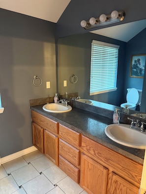 Shower, towels, soap, toilet paper