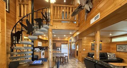 Family-friendly log cabin style house by Lewis & Clark Lake at DJ's Resort