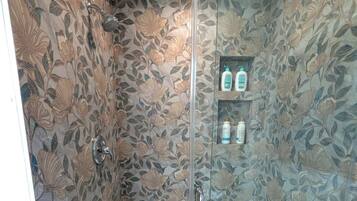 Shower, hair dryer, towels, soap