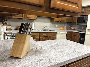 Private kitchen - Indoor Heated Pool inside Spacious 4-bedroom house in serene Escanaba with AC (Escanaba)