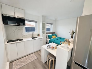 Suite estudio Confort, 1 cama Queen size, para no fumadores, cocineta | Sábanas de algodón egipcio, ropa de cama de alta calidad y wifi gratis