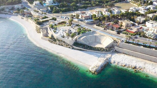 An aerial view of a coastal area with a large amphitheater, a beach, and residential buildings. - La Chicca Sul Mare Sea View, Bisceglie, Italy (Bisceglie)