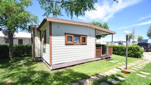 A small, single-story cabin with a porch, a window, and a door. - 2 bedroom beautiful home in Torino di Sangro (Torino di Sangro)