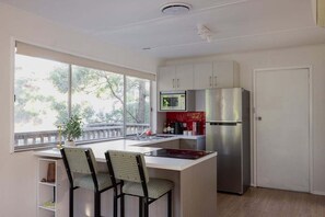 Private kitchen - Stewie's Nest - Port Arthur Shack with fire pit (Tasman)