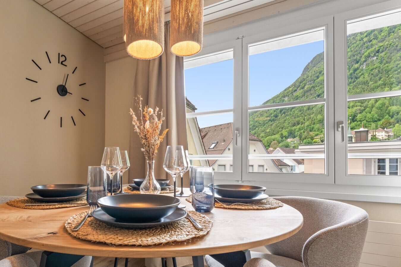 Gather around the table and enjoy your meals with beautiful mountain views and warm natural light pouring through the windows.