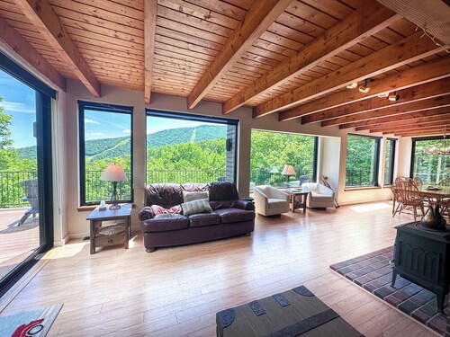 Experience the ultimate Vermont mountain getaway in this spacious 4-bedroom home located right at Sugarbush Resort. Ski-in/ski-out on the mountain, stunning mountain views, and a private sauna, this home is the perfect base for year round escapes.