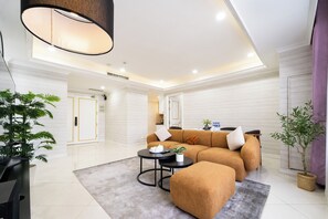 Living area - TV Lancaster D1 3BR Walk to City Center (Saigon Ward)