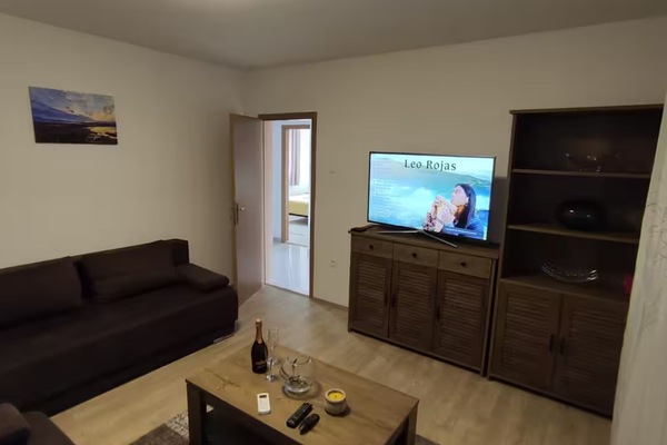 Apartment (Two Bedroom Apartment with Balcony an) | Living room | 32-inch flat-screen TV with cable channels