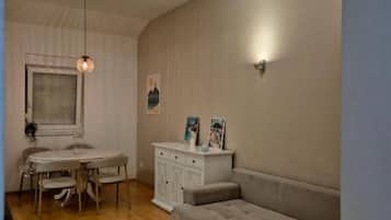 Apartment (Two Bedroom Apartment with Sea View a) | Living room | 32-inch flat-screen TV with cable channels