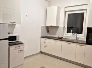 Apartment (Two Bedroom Apartment with Sea View a) | Private kitchen | Fridge - The Ipanema Zadar Apartment (Zadar)