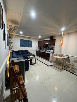 Living area - Gorgeous 1-bedroom apartment with AC in vibrant Islamabad (Islamabad)