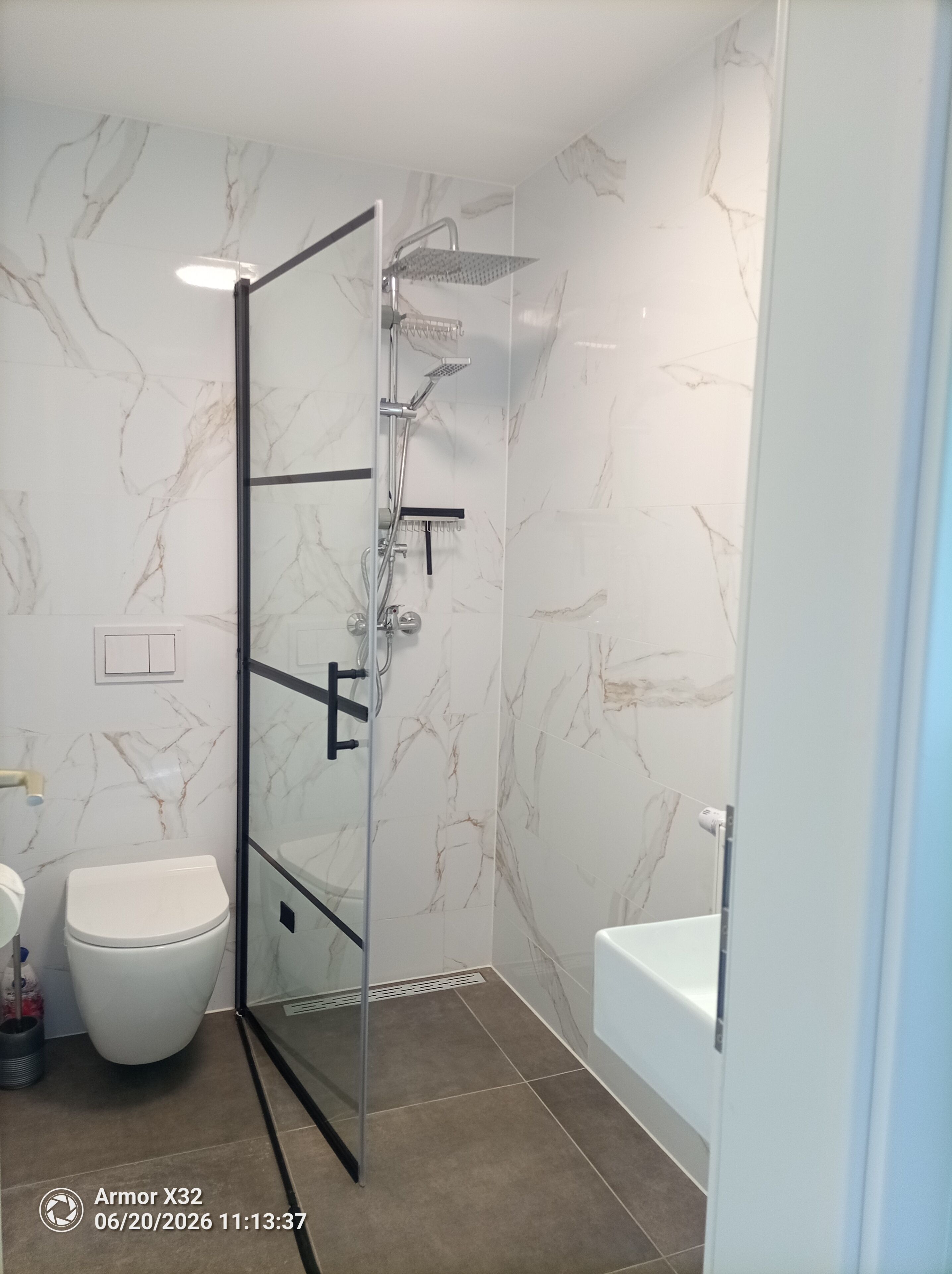 Shower, hair dryer, towels, toilet paper