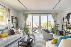 Living area - CasaNova Modern 1BR Condo King Bed Quiet Neighborhood w/ Pool • Beach Nassau (Nassau)