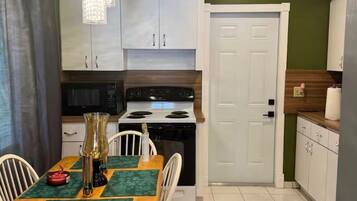 Coffee/tea maker, fridge, microwave, oven