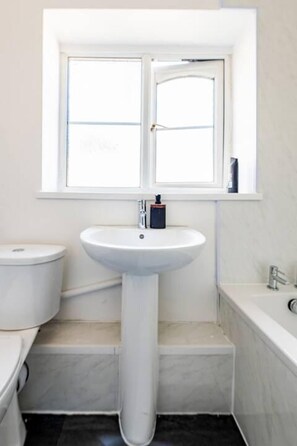 Combined shower/tub, deep soaking tub