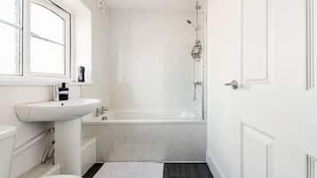 Combined shower/tub, deep soaking tub
