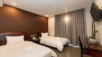 Deluxe Twin Room, City View | Desk, laptop workspace, free WiFi