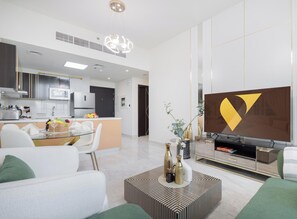 Apartamento Deluxe, balcón, vistas a la ciudad | Zona de estar
