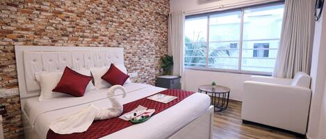 Desk, laptop workspace, free WiFi, bed sheets