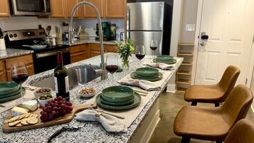 Microwave, stovetop, dishwasher, coffee/tea maker