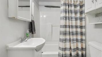 Hair dryer, towels, soap, shampoo