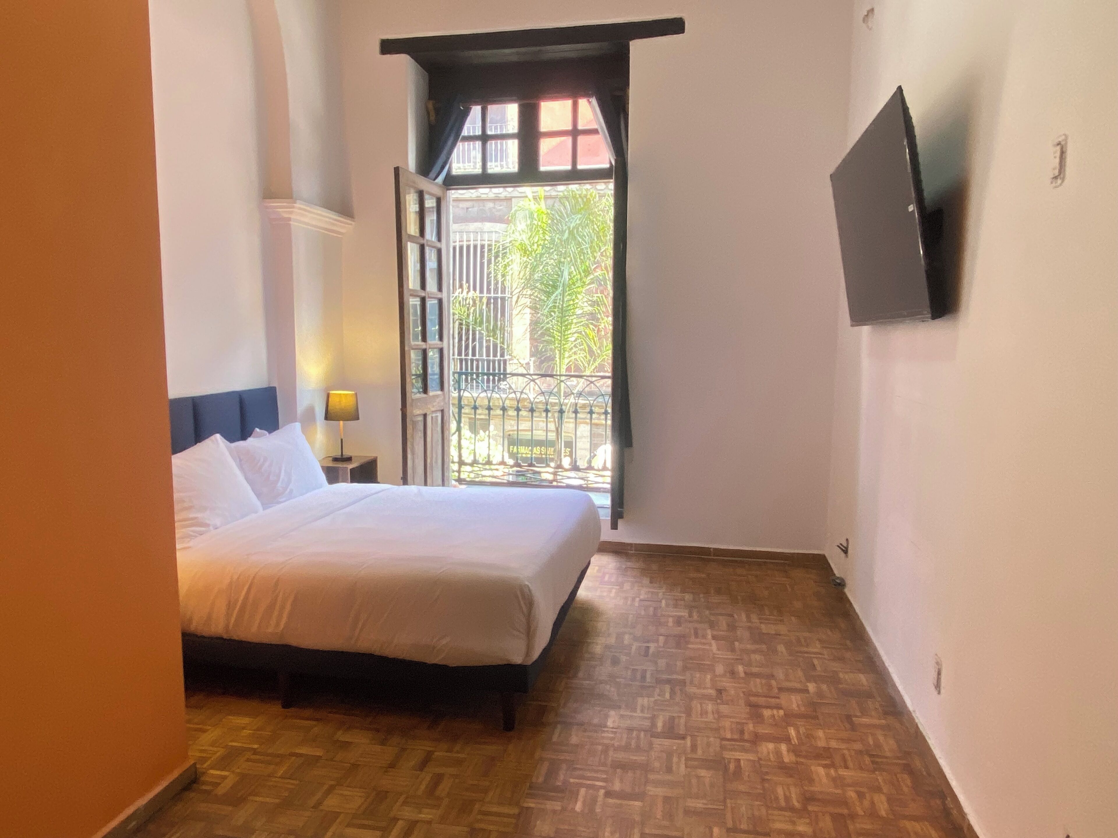 Basic Double Room, Balcony, City View | Iron/ironing board, free WiFi, bed sheets
