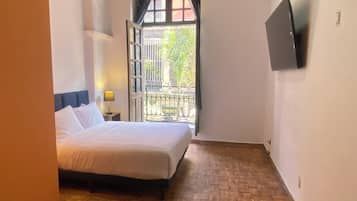 Basic Double Room, Balcony, City View | Iron/ironing board, free WiFi, bed sheets
