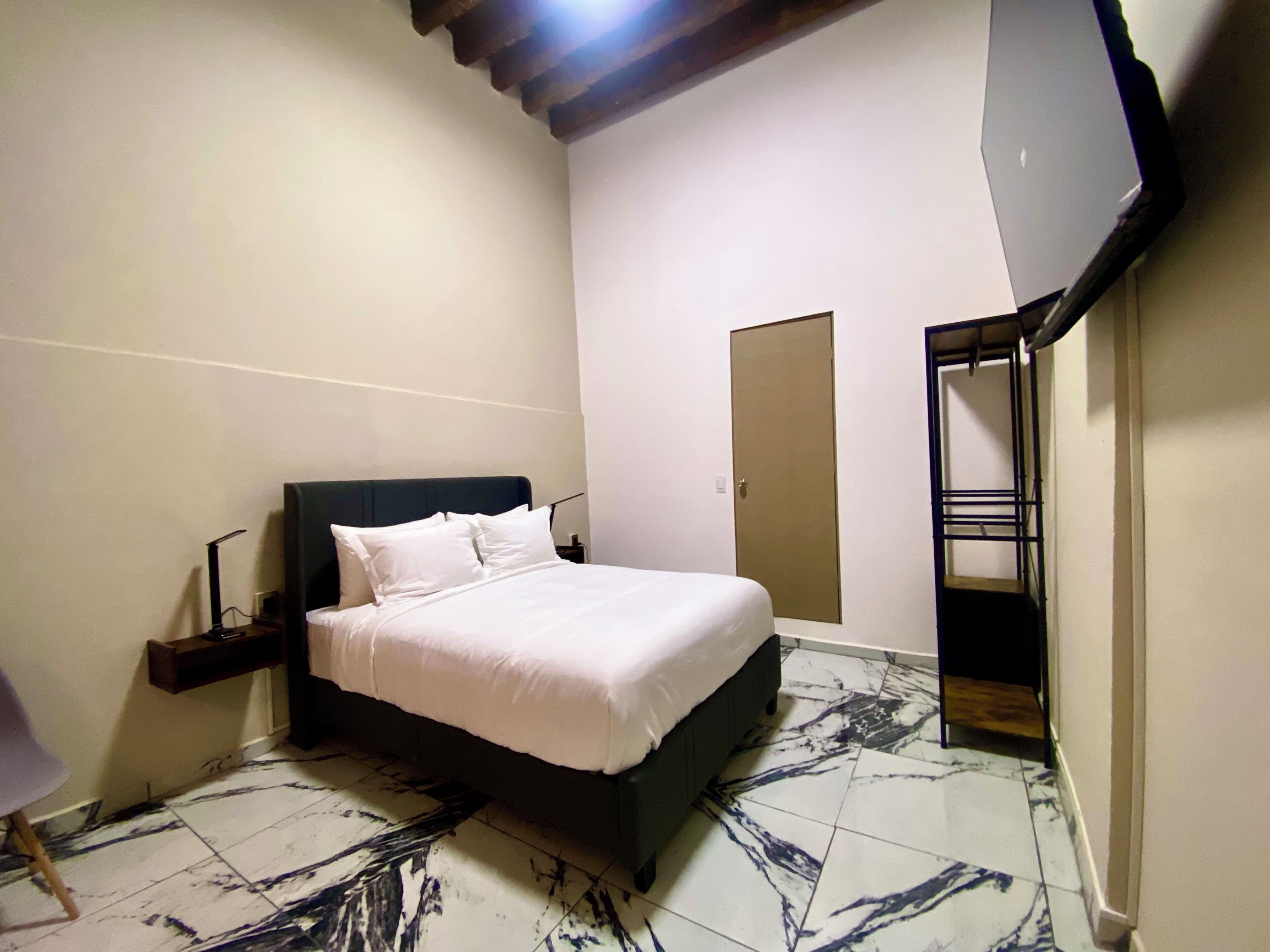 Basic Double Room | Bathroom | Combined shower/tub, free toiletries, hair dryer, towels