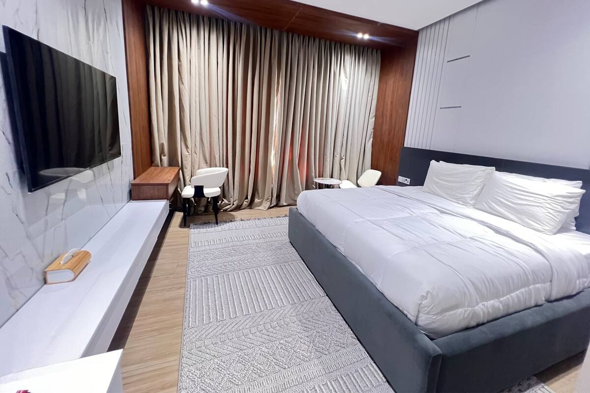 ห้องดีลักซ์ซิงเกิล, วิวสวนหย่อม | ตู้นิรภัยในห้องพัก, โต๊ะทำงาน, พื้นที่ทำงานแบบใช้แล็ปท็อป, ผ้าม่านกันแสง