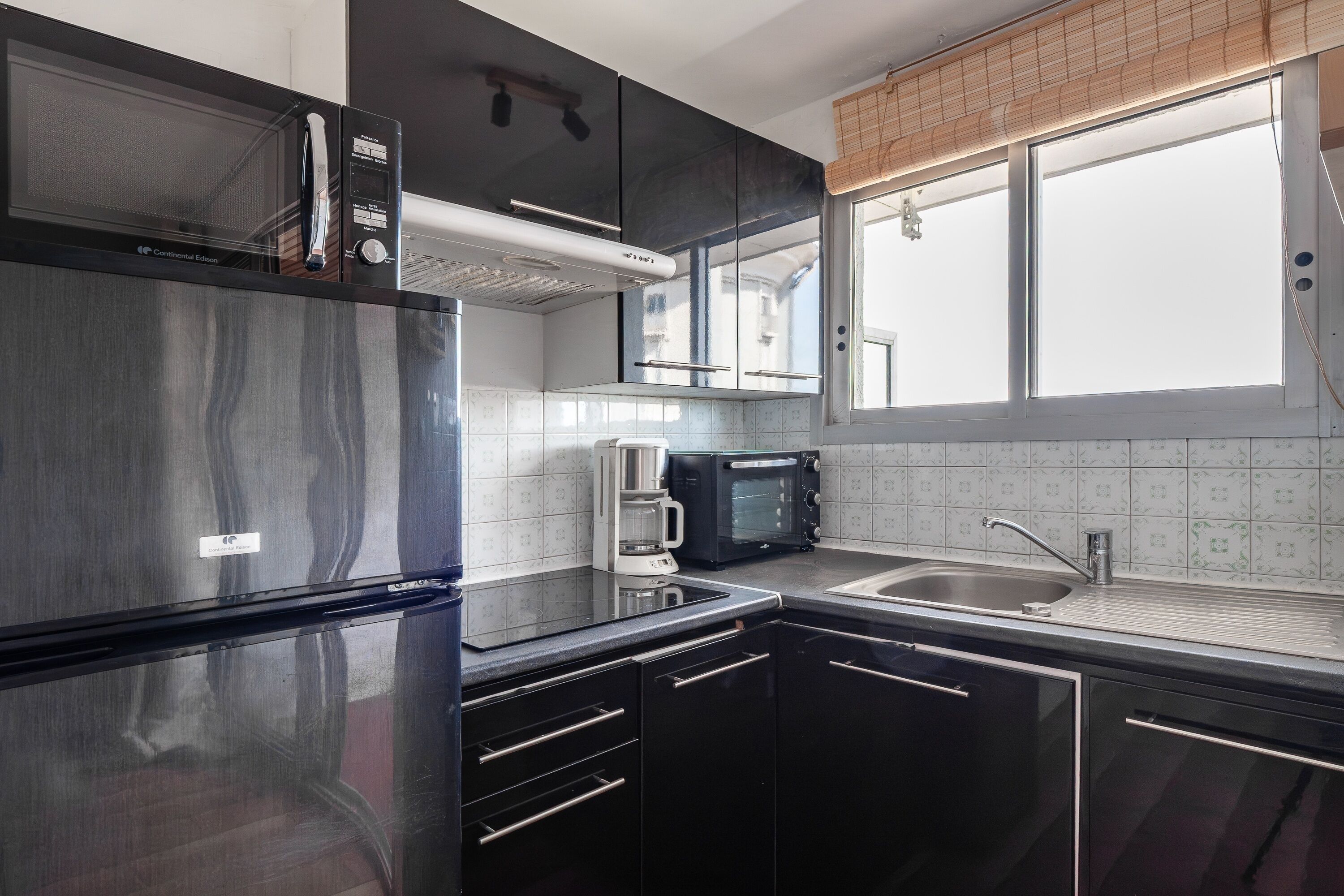 Fridge, microwave, coffee/tea maker, toaster