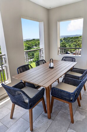 Dining - Ocean view and Ocean front 3BR condo in serene Aguada with AC for relaxing stays (Aguada)