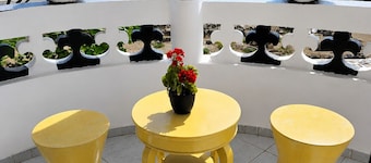 Full room with a balcony overlooking the sea