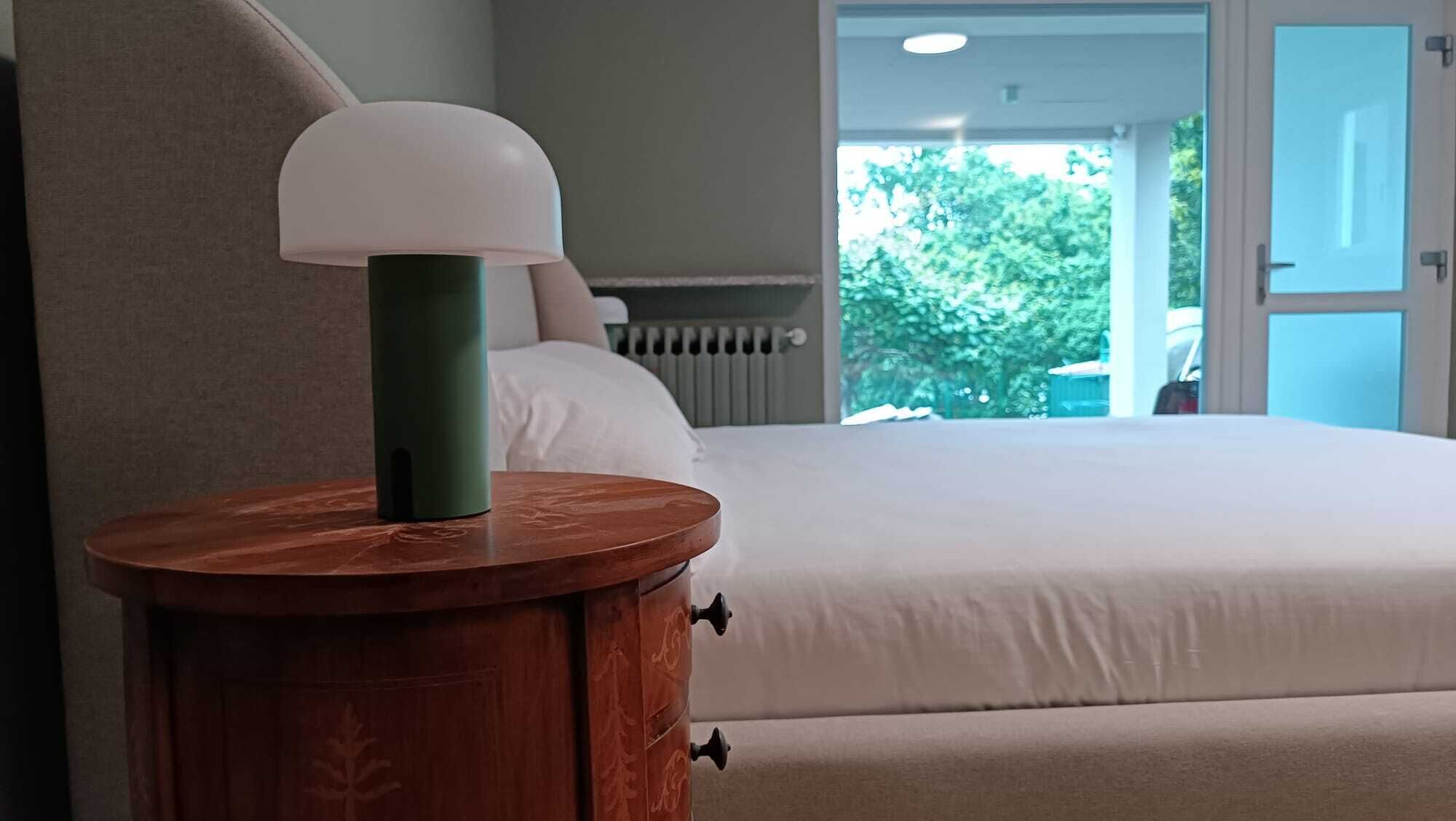 Premium bedding, down comforters, memory foam beds, laptop workspace