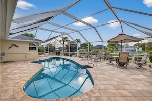 Outdoor pool, a heated pool - Gulf Access Pool Home, Sleeps 9, Minutes to Open Water (Cape Coral)