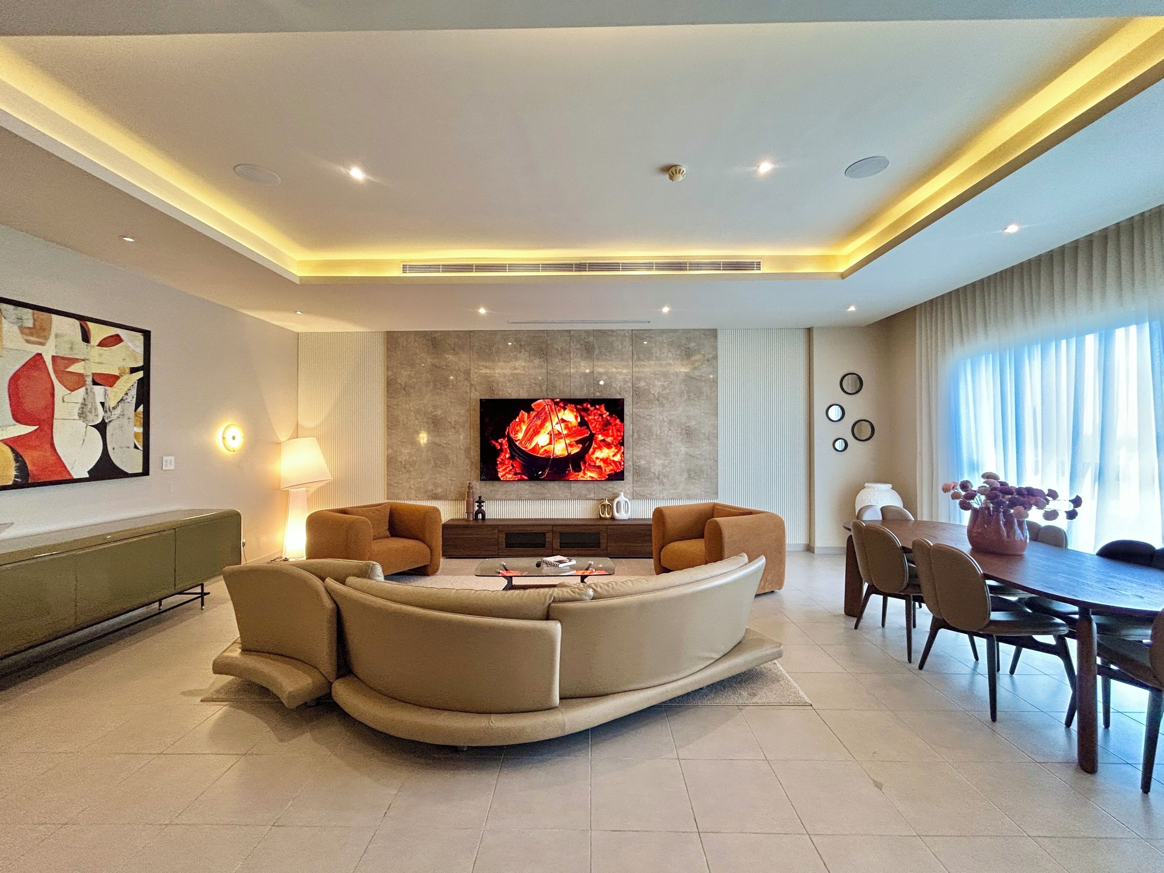 Executive Penthouse, City View | Living area | 65-inch Smart TV with satellite channels, Netflix, streaming services