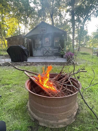 Enjoy nature in this 1-bedroom cabin with AC/Heat in rural Knoxville, Iowa.