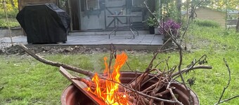 Enjoy nature in this 1-bedroom cabin with AC/Heat in rural Knoxville, Iowa.