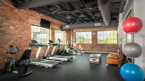 A gym with treadmills, stationary bikes, and exercise balls. - Landing | Incredible 2BD, Clubhouse, Pool (Fort Worth)