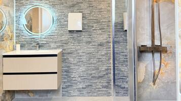 Shower, towels, toilet paper