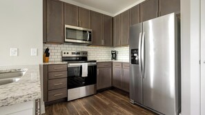 Fridge, dining tables - Landing | Amazing 1BD, Game Room, Gym (Charlotte)