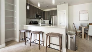 Fridge, dining tables - Landing | Spectacular 2BD, Game Room, Gym (Charlotte)